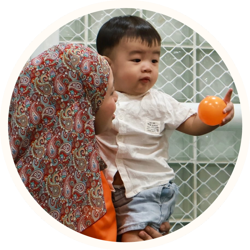 Kindergarten Teaching Carrying an Infant